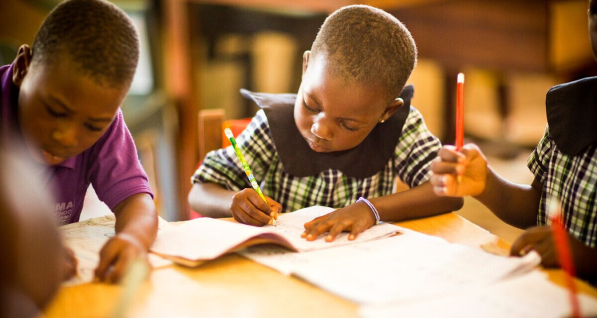 Pupils reading together during library time